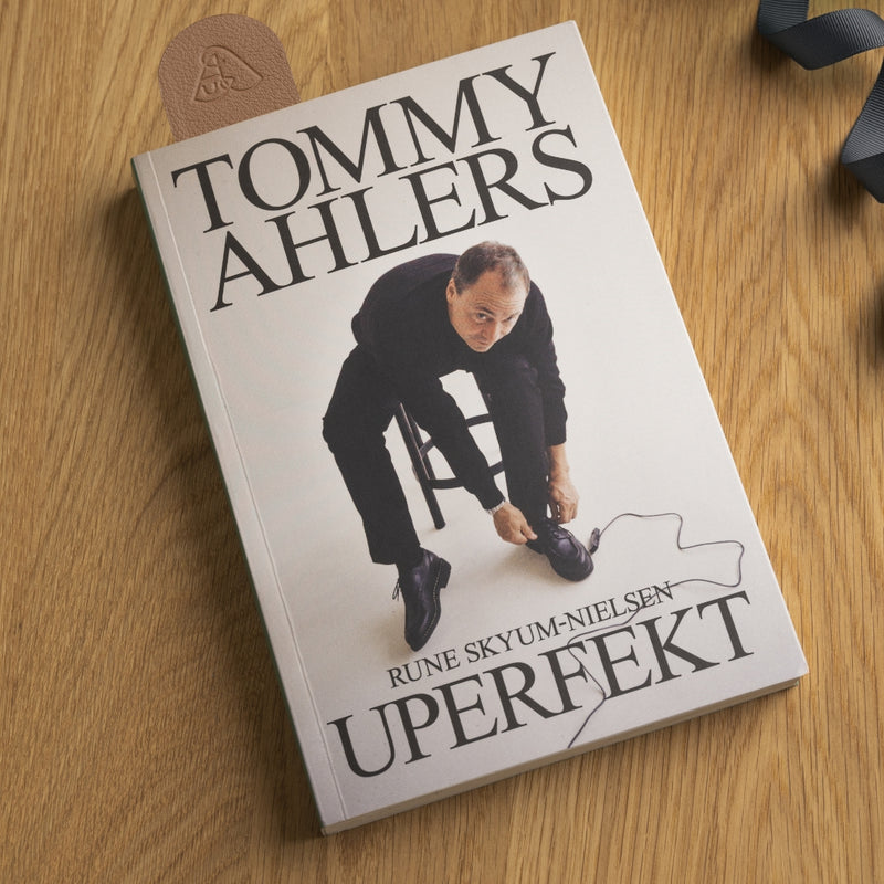 A signed copy of Tommy Ahlersl's Uperfekt & a personalised bookmark